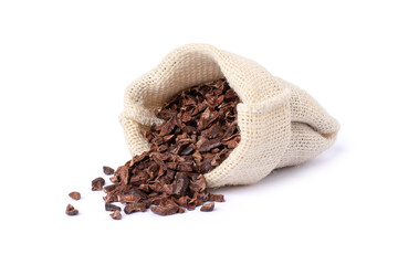 Cocoa nibs in sack bag isolated on white background.