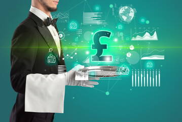 Handsome young waiter in tuxedo holding currency icons on tray