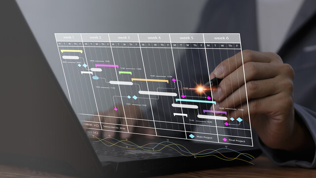Analysts work with computers in management systems to create reports with KPIs and metrics connected to databases.