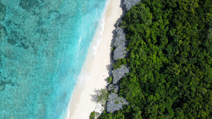Aerial drone view of uninhabited Jaco Island in Timor-Leste, Southeast Asia, landscape view of long...