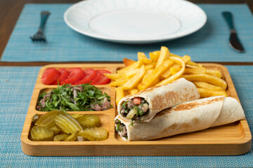 Shawarma Plate, Shawarma Beef served with pickles, veggies and tomatoes with tahina dip	
