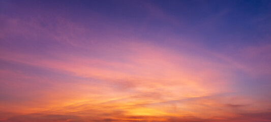 Fototapeta na wymiar Photos of twilight sky before sunrise or after sunset, clouds fill the sky, panorama image. orange tones, natural phenomenon background.