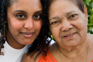 Portrait of a grandmother and granddaughter together