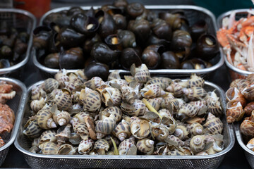 Vietnamese street food in late afternoon light. Taken on the streets of Saigon or Ho Chi Minh City.