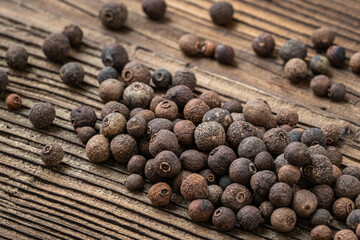 Allspice spice on wooden table