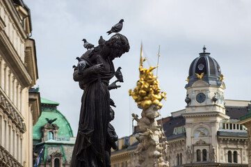 Pigeons on a statue in oldtown Vienna, Austria