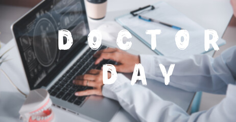 Doctor Day Concept. Nurse working using computer browsing internet, female doctor wear uniform in hospital typing information on keyboard laptop, Healthcare medical website technology online