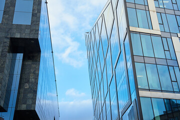 Modern office building glass facade. Skyscraper exterior. Architecture details.
