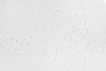 Rough surface of a white painted plastered wall of a living room as a background