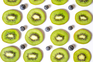 Kiwis and Blueberries Lined up in Studio
