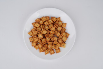Top Shot of Jeera Bites in White Plate