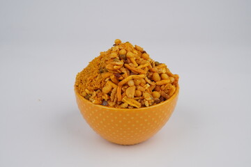 Front Shot of Gujrati Mix [Bhusa] Indian Namkeen In Yellow Bowl