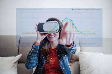 Happy woman wearing virtual reality simulator at home