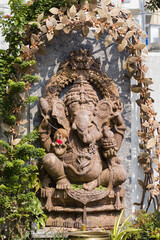 idol of lord ganesha for worshipping during ganesh chaturthi festival in maharashtra india. shot against black background.