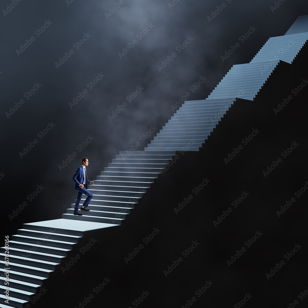 Poster long career and long way to success concept with man in blue suit climbs dark stairs illuminated fro