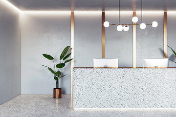 Front view on stylish reception desk with modern computers, golden wall decoration background, green plant on concrete floor and illuminated ceiling. 3D rendering