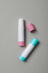 Concept of different office stationery with glue