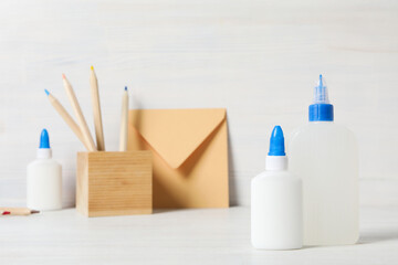 Concept of different office stationery with glue