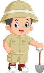 a cute adventurous boy poses with a shovel to dig for treasure