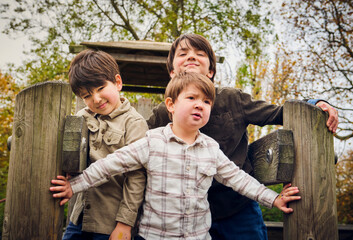 Cute brothers playing together at park