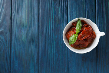 Concept of tasty food - delicious dried tomato
