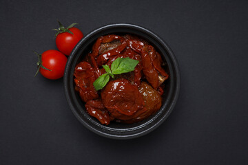 Concept of tasty food - delicious dried tomato