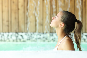 Woman breathing bathing in spa