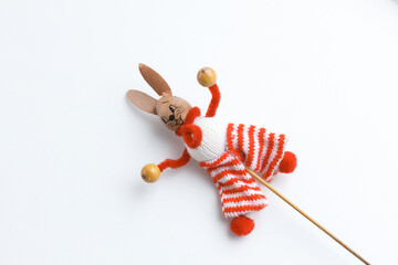 Easter toys. Easter rabbits on white background, copy space.