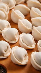 Semi finished russian pelmeni dumplings on cutting board