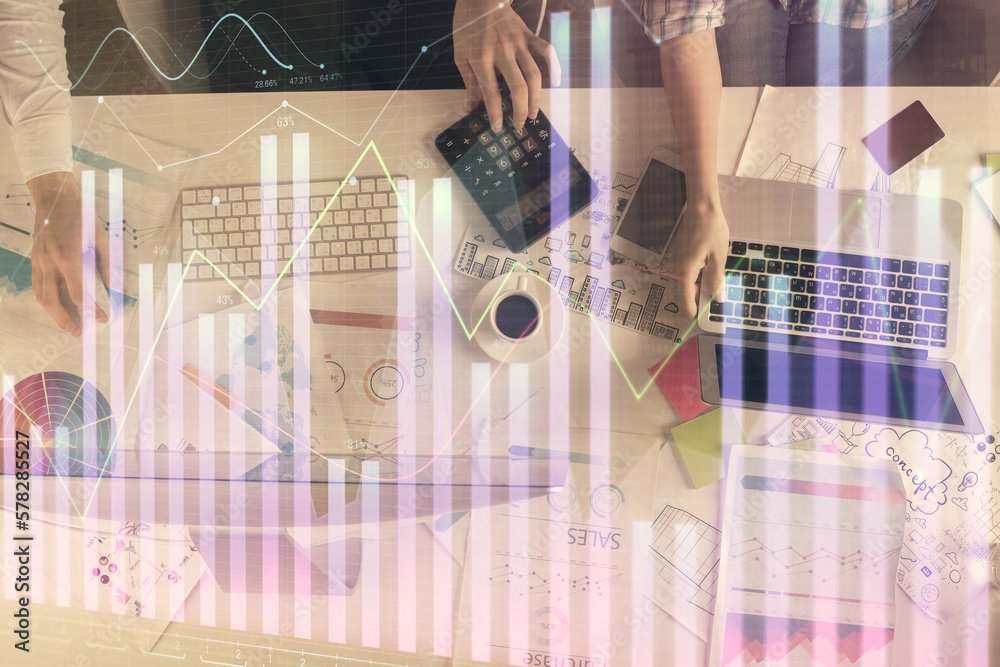Poster multi exposure of man and woman working together and financial chart hologram. business concept. com