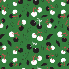 Seamless pattern of Black and White Cherries on green blackground ideal for fabric,print,card,wallpaper,mobile case etc
