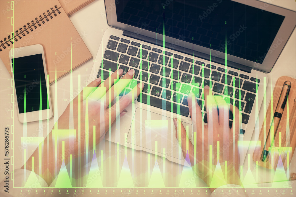 Poster double exposure of woman hands working on computer and forex graph hologram drawing. top view. finan