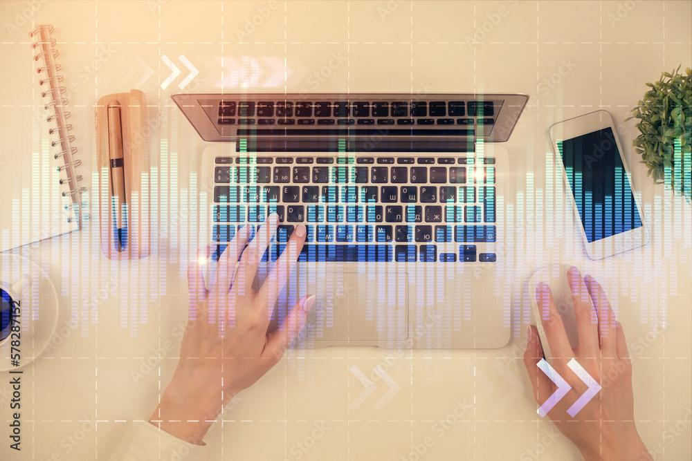 Poster double exposure of woman hands working on computer and forex chart hologram drawing. top view. finan