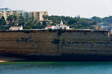 Fototapeta premium Chapel at Nossa Senhora de Rocha and rock formations Algarve Portugal