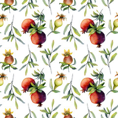 Watercolor seamless pattern with pomegranates fruits on branch with leaves on white background for cosmetics wrapping
