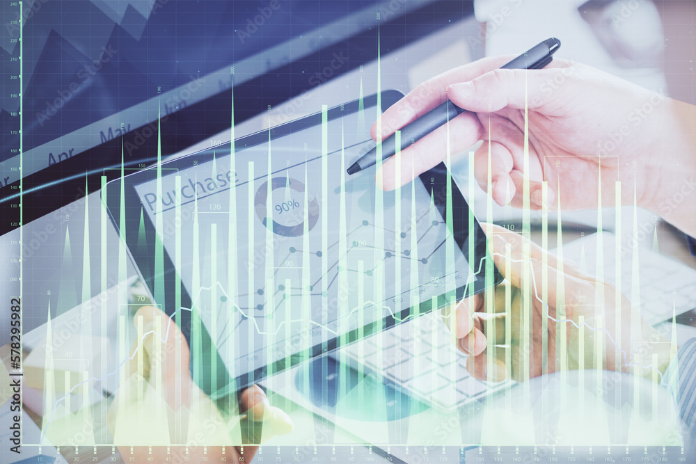 Aufkleber double exposure of man's hands holding and using a phone and financial chart drawing. market analysi