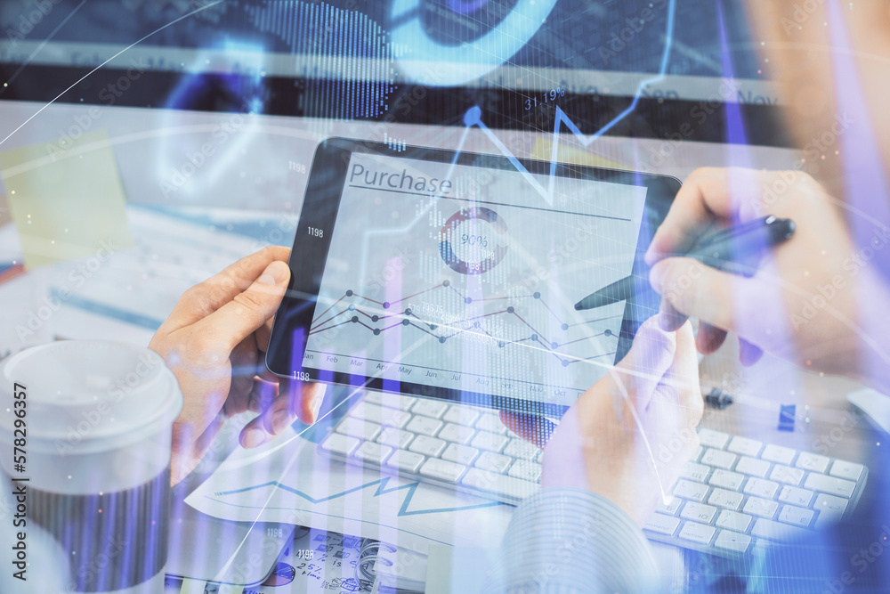 Poster double exposure of man's hands holding and using a phone and financial chart drawing. market analysi