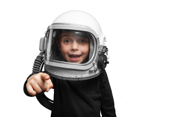 Small child wants to fly an in space wearing an astronaut helmet.