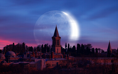 Topkapi Palace with crescent moon at sunset - Istanbul Turkey 