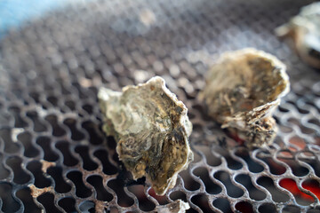 Grilled fresh oyster in Taiwan, famous street food.