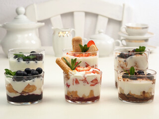 Glasses with yogurt-berry desserts