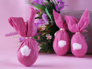 Three pink handmade Easter bunnies