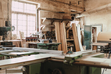 Carpentry shop interior with wood and tools