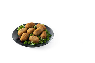 Traditional spanish fried croquettes isolated on white background. Copy space