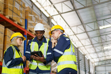Diversity ethnicity of warehouse staff or engineer making a discussion together before start...