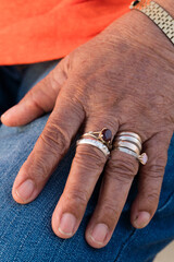 Hand of the senior woman with rings