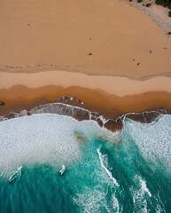 "From Above: Woolacombe Beach Waves Crashing. Aerial View of Dramatic Coastal Scene."