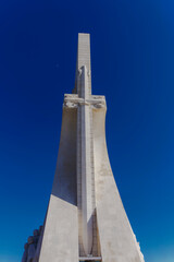 Obraz premium Lisbon, Portugal limestone Monument to the Discoveries. Tagus river Belem waterfront Padrao dos Descobrimentos sword side view.