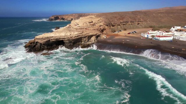 Fuerteventura island scenery - picturesque traditional fishing village Ajui, with black sand beaches. Canary islands of Spain
