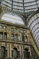 Obraz premium Naples, Italy inside Galleria Umberto I. Detail of glass-and-iron covered 19th century shopping gallery housing shops and cafes.